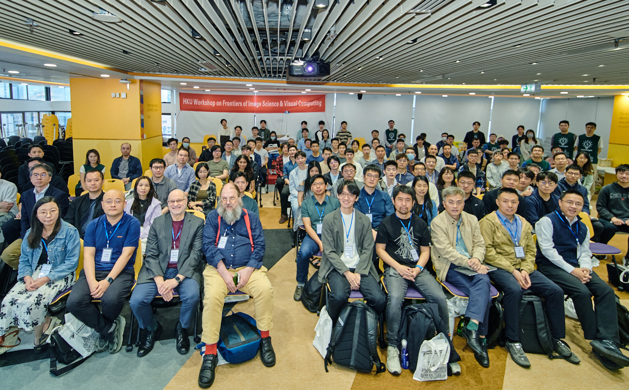 Group photo of the speakers and participants.