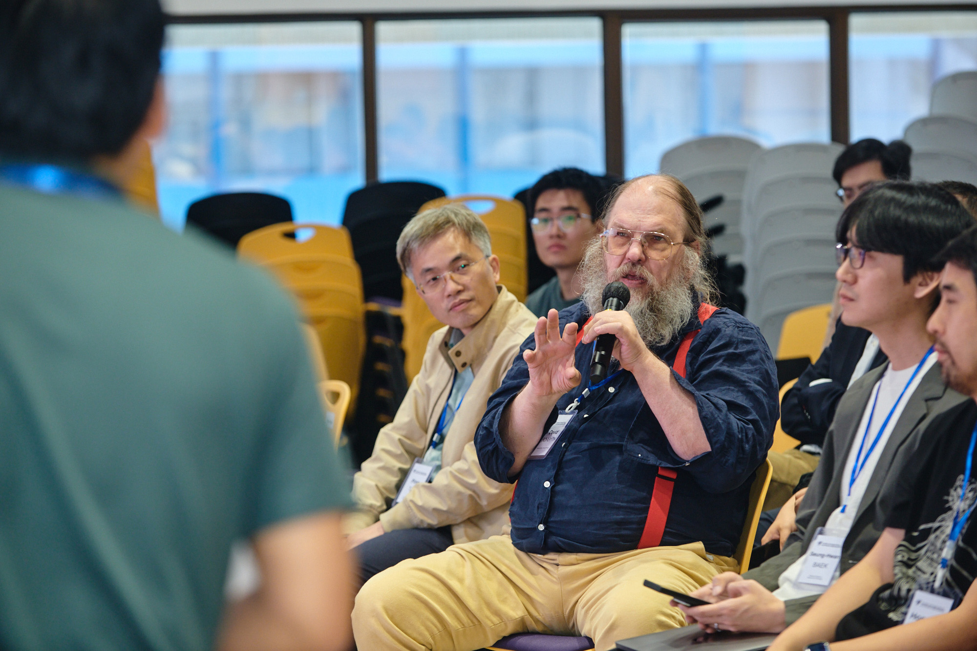 Active participants and speakers engaging in the Q&A and tea break sessions.