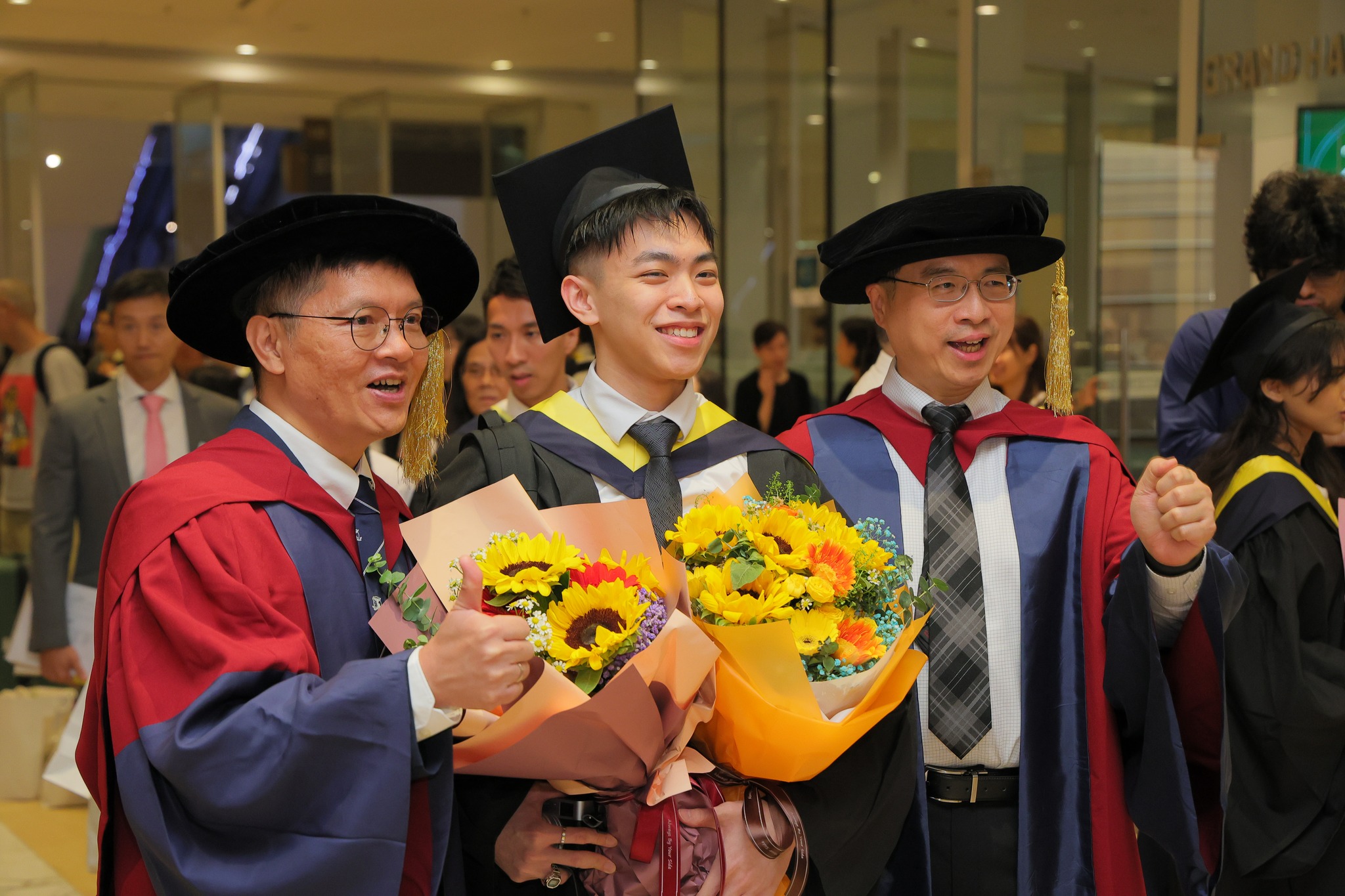 Group photo of teacher and student