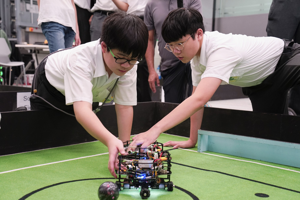 A student group focused on the challenge of robot soccer.