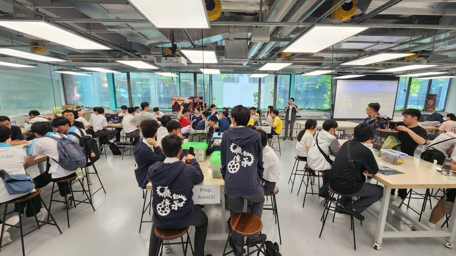 Student teams' prepare their product in the preparation zone.