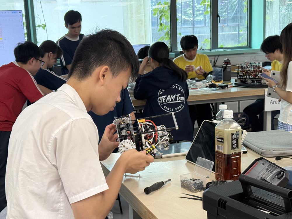 Student teams' prepare their product in the preparation zone.